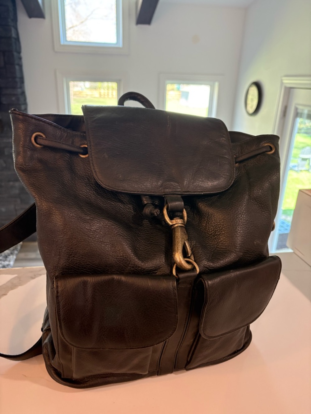 Black clasp and drawstring backpack